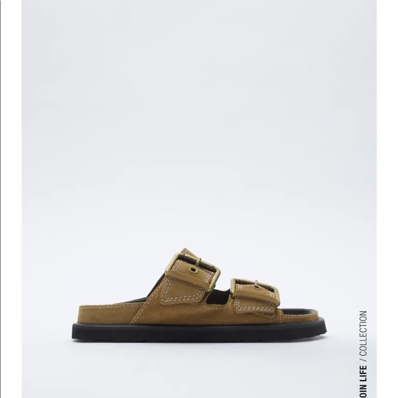 Buckled flat leather sandals